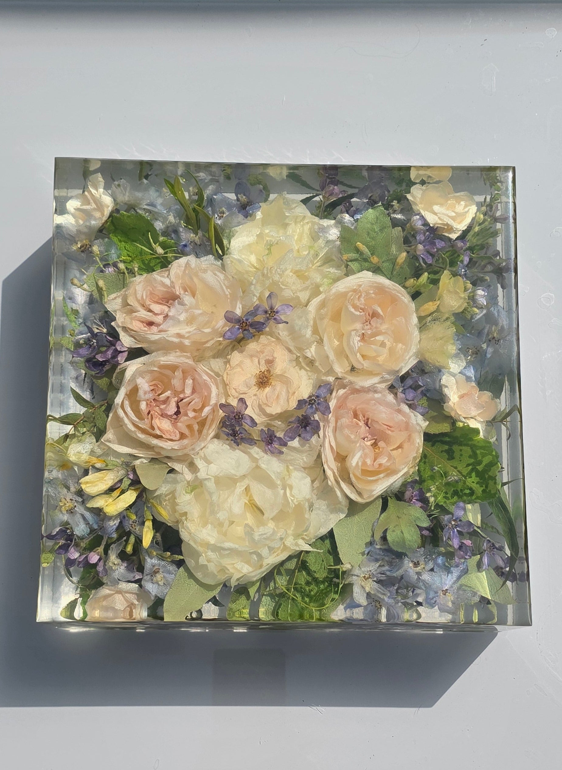 10×10 wedding bouquet preserved in a clear resin block with blush roses, handmade by Alma Makes