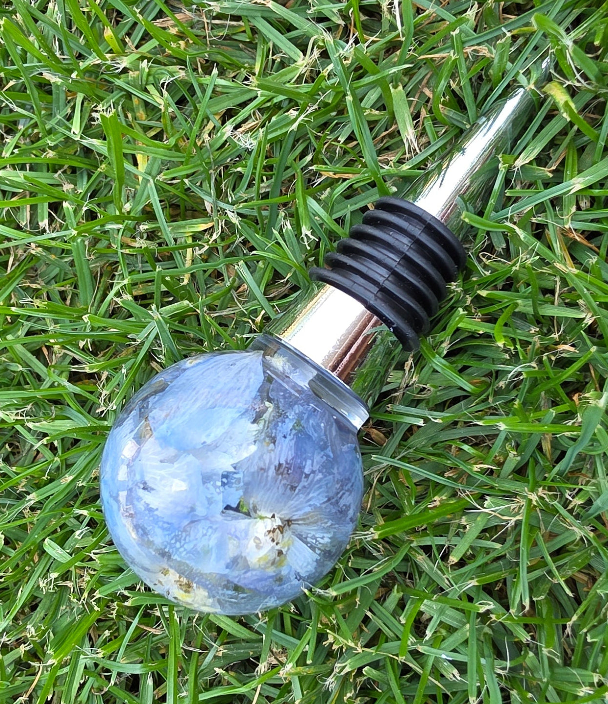 Custom floral resin wine bottle stopper with preserved flowers, handmade by Alma Makes