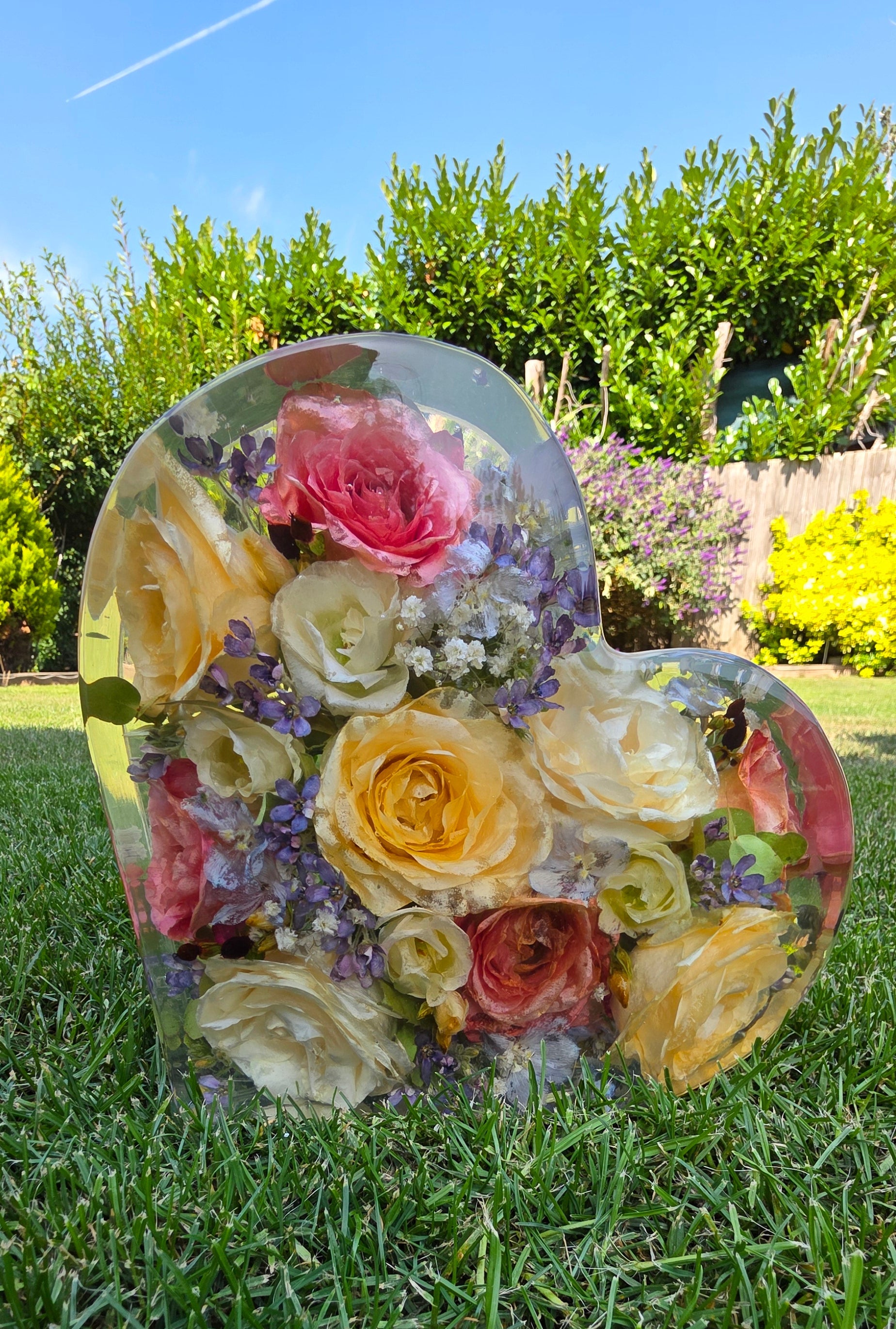 Wedding bouquet preserved in a heart-shaped resin block , handmade by Alma Makes