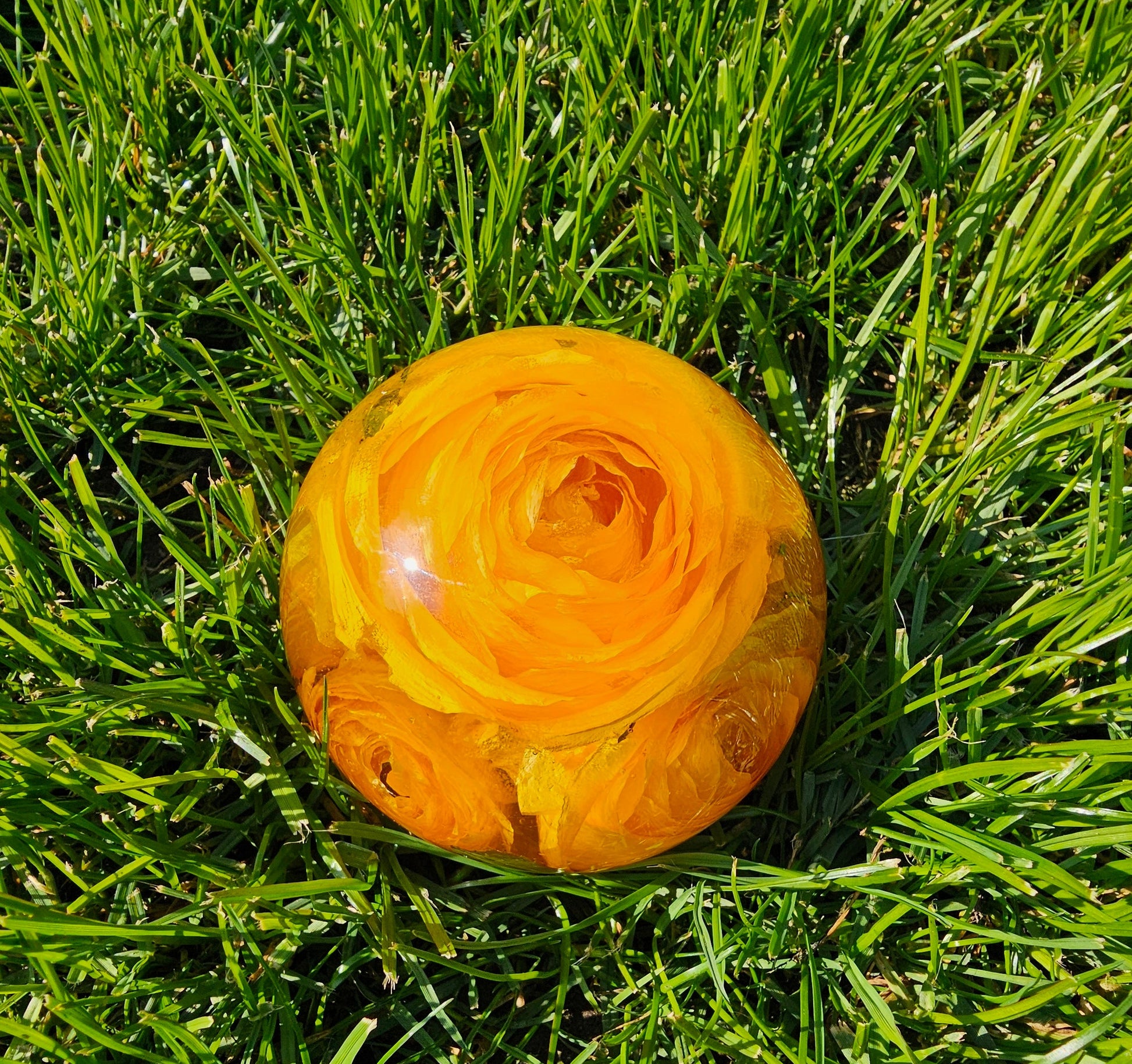 Pet memorial flowers preserved in a 4" resin sphere keepsake